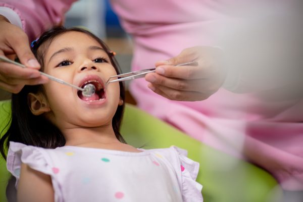 Little Asian girls teeth are healthy in the Dental office. Dental care, Dentist care.